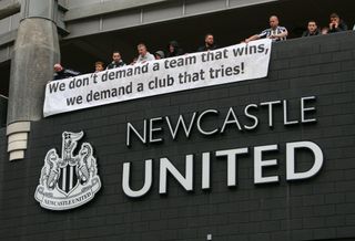 Newcastle United fans hold up a protest banner ahead of the proposed takeover Scenes at St. James's Park, Newcastle as news of a takeover emerges on Thursday 7th October 2021. (Photo by Michael Driver/MI News/NurPhoto via Getty Images)
