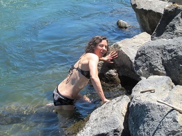 Mary McConneloug soaks her legs in the Big Wood River