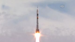 A Russian Soyuz rocket launches into space from Baikonur Cosmodrome in Kazakhstan on Sept. 2, 2015 to ferry three new crewmembers to the International Space Station. The Soyuz launched space travelers from Russia, Denmark and Kazakhstan during the flight.