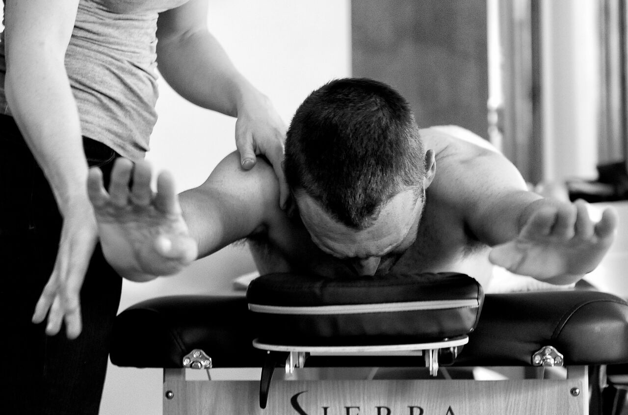 A rider gets a massage after a hard day of training