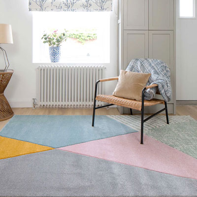 pastel geometric area rug
