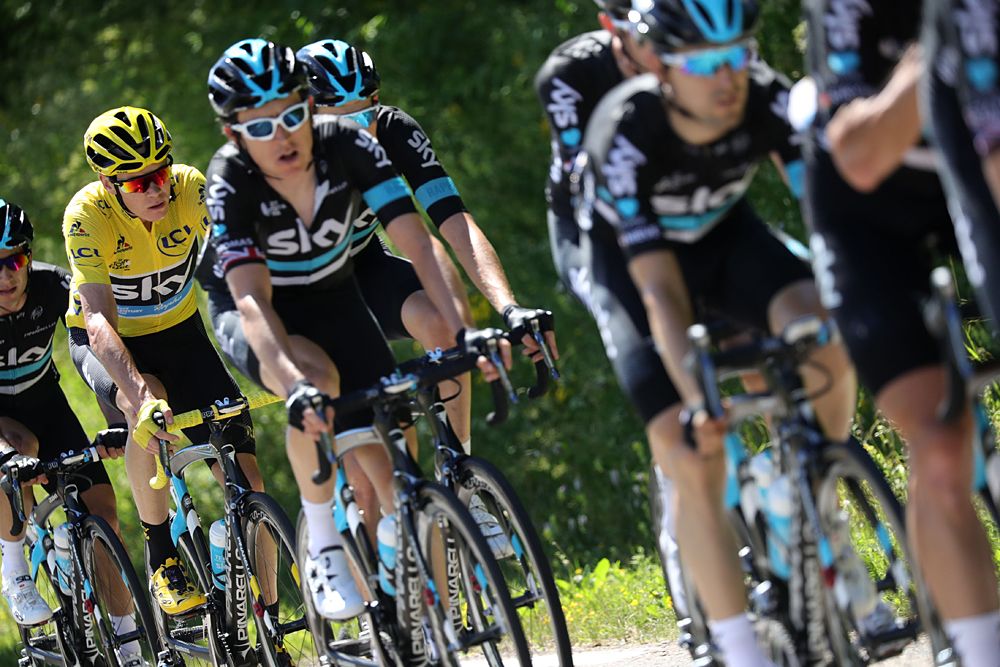Team Sky lead the way with yellow jersey Chris Froome on their wheels