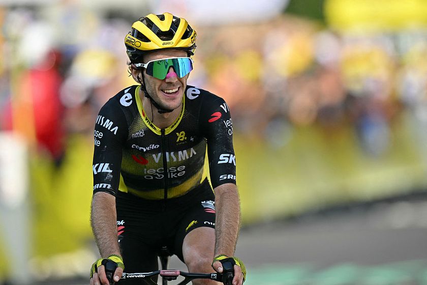 Team Visma - Lease a bike team's British rider Simon Yates cycles past the finish line to win the 10th stage of the 112th edition of the Tour de France cycling race, 165.3 km between Ennezat and Le Mont-Dore Puy de Sancy, in central France, on July 14, 2025. (Photo by Loic VENANCE / AFP)