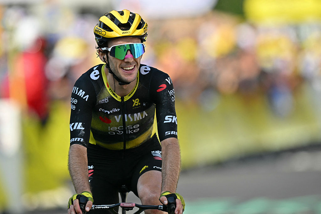 Team Visma - Lease a bike team's British rider Simon Yates cycles past the finish line to win the 10th stage of the 112th edition of the Tour de France cycling race, 165.3 km between Ennezat and Le Mont-Dore Puy de Sancy, in central France, on July 14, 2025. (Photo by Loic VENANCE / AFP)