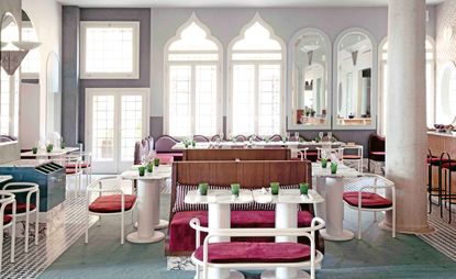 Restaurant, pink cushions wooden benches and white steel benches