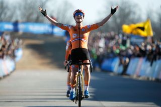 FAYETTEVILLE ARKANSAS JANUARY 29 Marianne Vos of Netherlands celebrates at finish line as race winner ahead of Lucinda Brand of Netherlands during the 73rd UCI CycloCross World Championships Fayetteville 2022 Womens Elite Fayetteville2022 on January 29 2022 in Fayetteville Arkansas Photo by Chris GraythenGetty Images