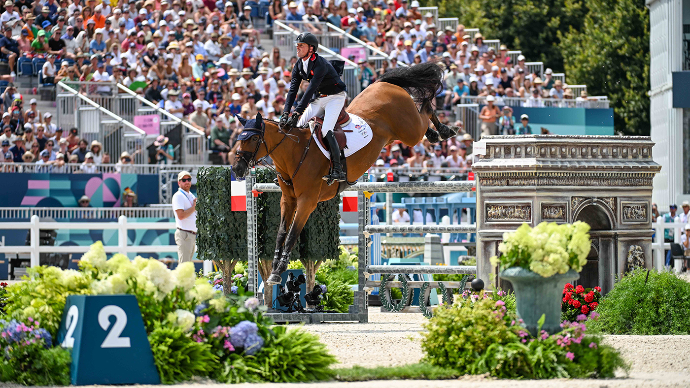 Ben Maher and Dallas Vegas Batilly on their way to helping Britain win team gold.