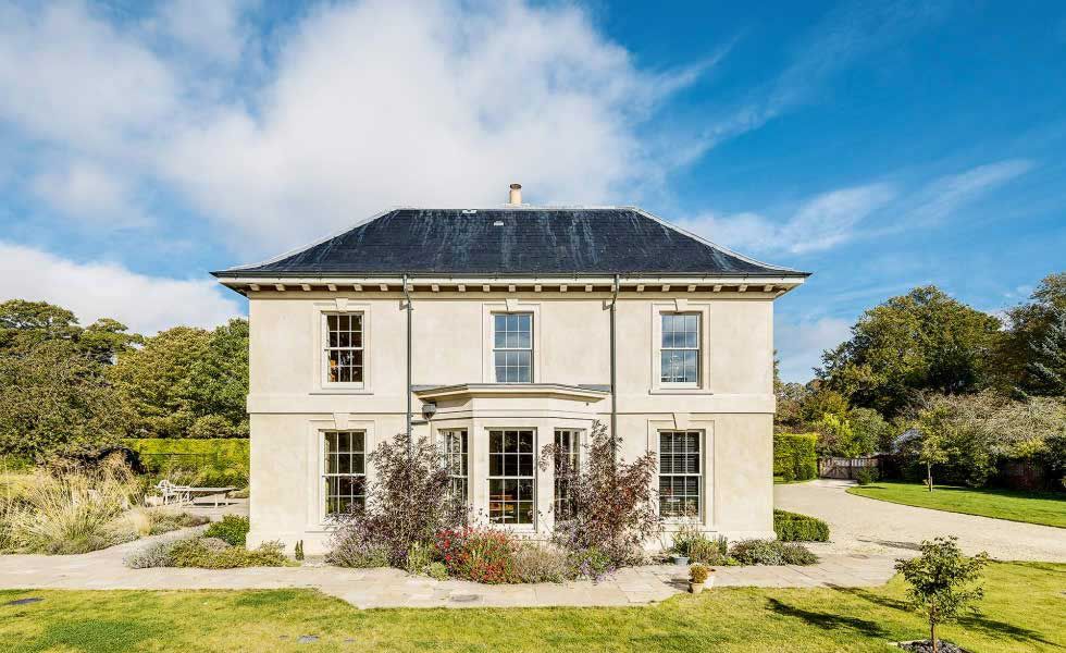 georgian style self build with sash windows and gravel garden