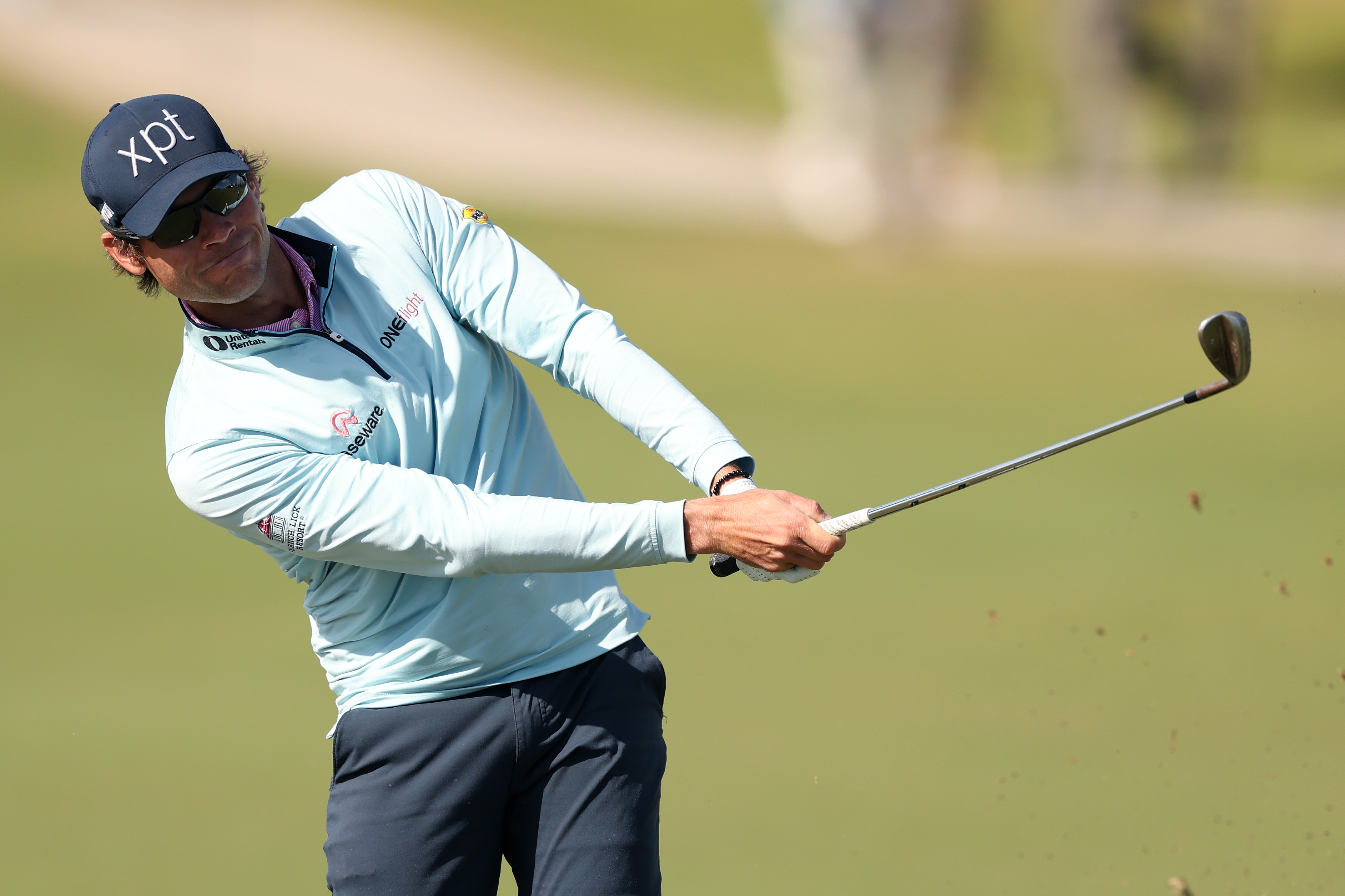 Adam Schenk hits a wedge