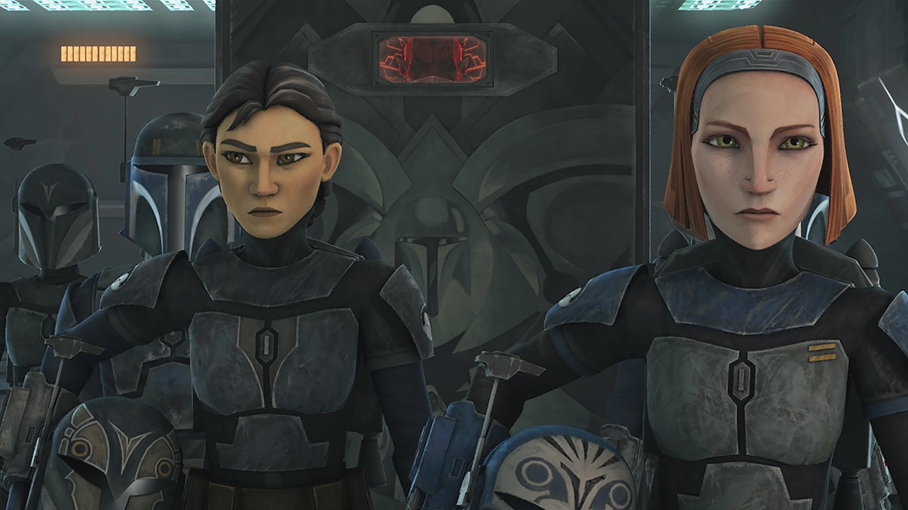Bo-Katan Kryze and Ursa Wren standing side by side, both with their helmets under their arm-The Clone Wars (animated).