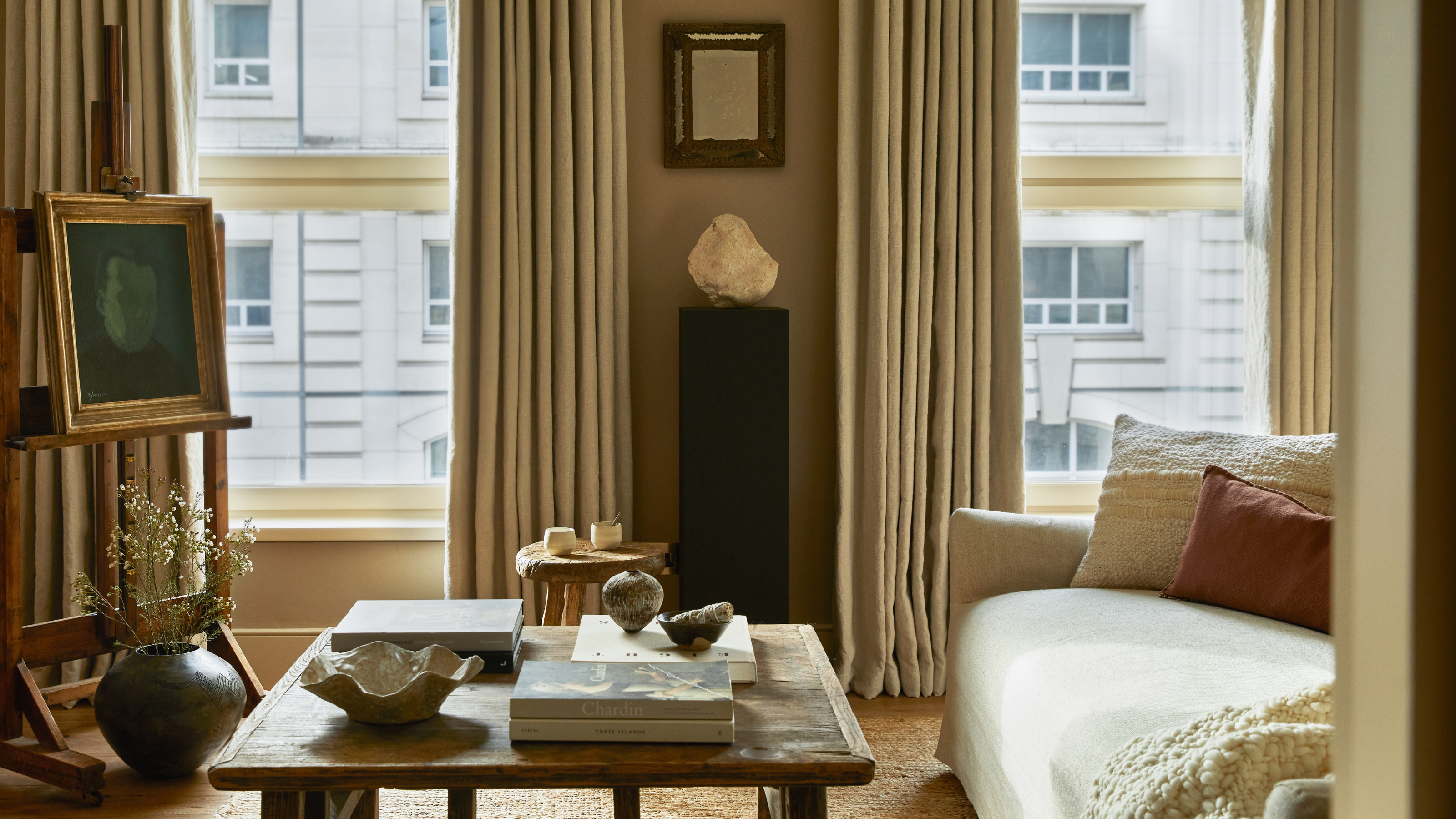 warm, neutral living room with mediterranean design style