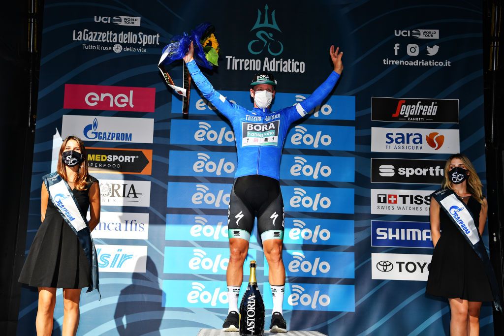 FOLLONICA ITALY SEPTEMBER 08 Podium Pascal Ackermann of Germany and Team BoraHansgrohe Blue Leader Jersey Celebration Miss Hostess during the 55th TirrenoAdriatico 2020 Stage 2 a 201km stage from Camaiore to Follonica TirrenAdriatico on September 08 2020 in Follonica Italy Photo by Justin SetterfieldGetty Images