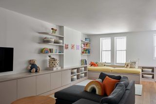 A child's room with storage and natural light