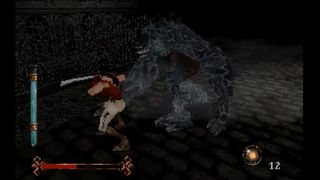 Fighting a large monster in Nightmare Creatures
