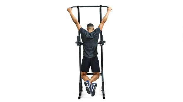 Man hangs from pull-up bar