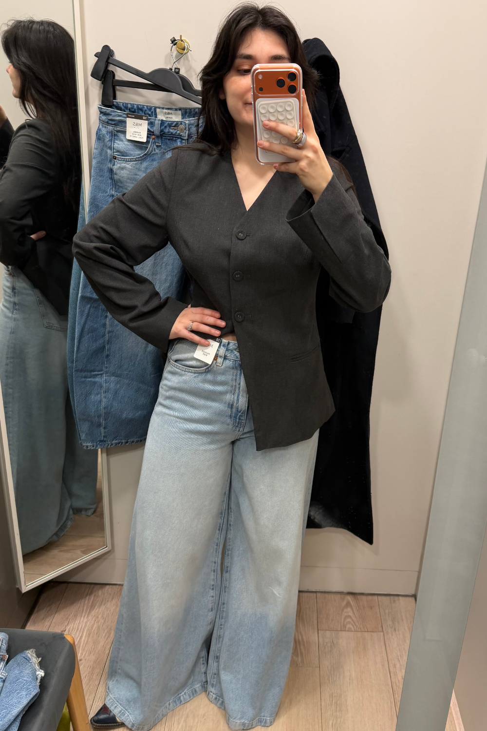 Sofia wearing palazzo jeans