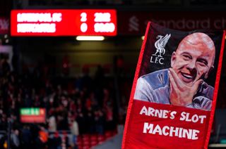 A banner depicting Liverpool head coach Arne Slot, reading 'Arne's Slot Machine' at the Premier League match against Newcastle United at Anfield in Liverpool on 26 February, 2025