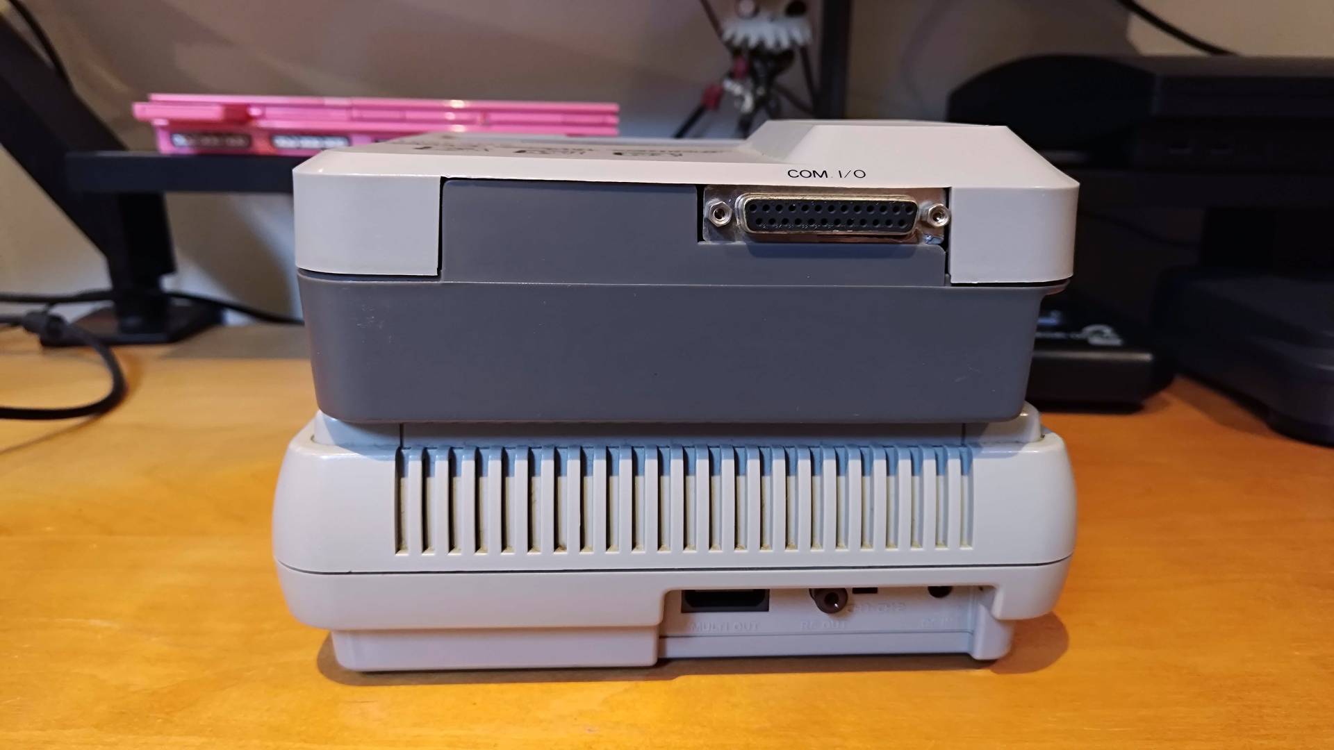 Back view of Super Wild Card connected to Japanese SNES (Super Famicom).