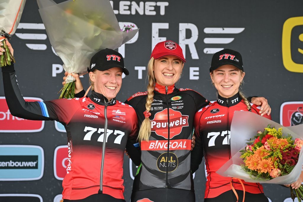 Netherlands Annemarie Worst L Netherlands Denise Betsema C and Netherlands Inge van der Heijden R celebrate on the podium after the women elite race of the Cyclocross Ruddervoorde the second stage of the Superprestige cyclocross cycling competition in Ruddervoorde western Belgium on October 23 2021 Belgium OUT Photo by DAVID STOCKMAN BELGA AFP Belgium OUT Photo by DAVID STOCKMANBELGAAFP via Getty Images