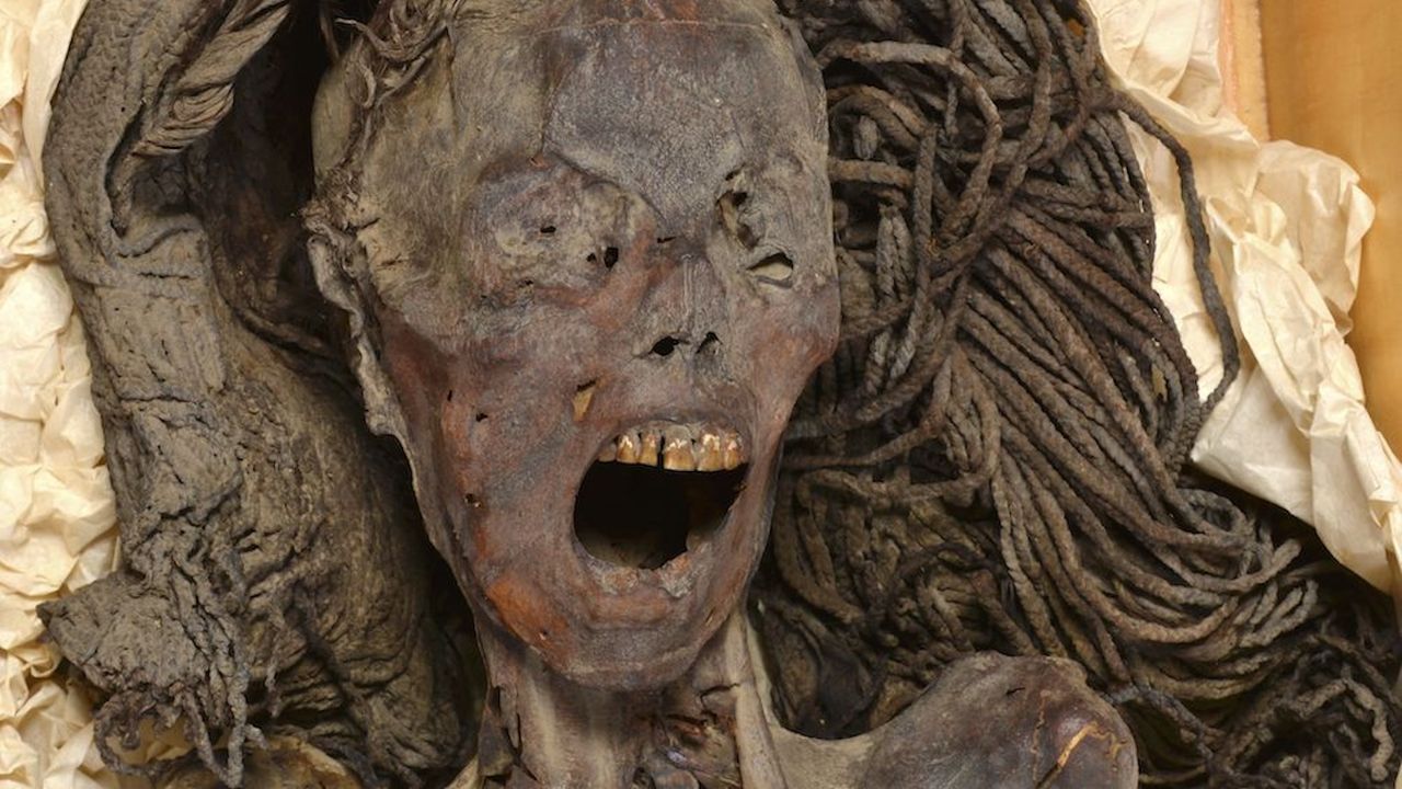 screaming woman with a gaping mouth