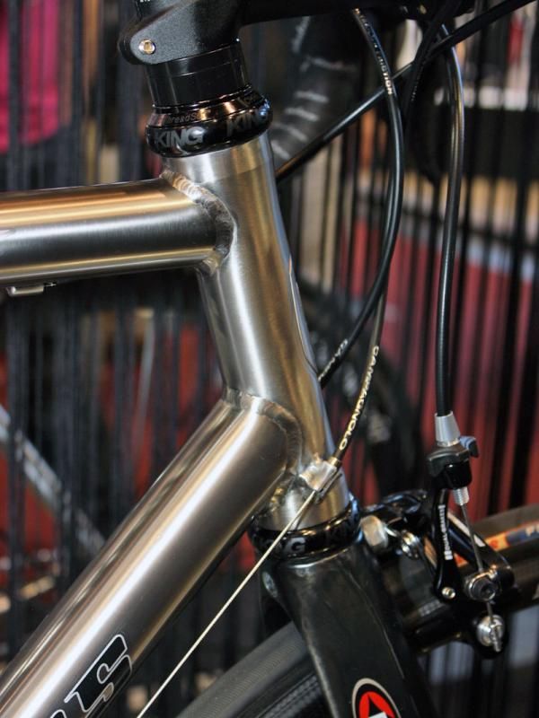 Cable stops are welded directly to the Chinook's straight head tube.