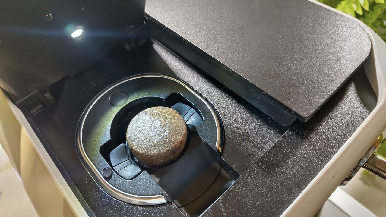 AltaRound coffee pod inserted in Keurig Alta coffee maker