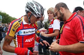 Mauricio Soler (Barloworld) examines his wrist after crashing during the stage.