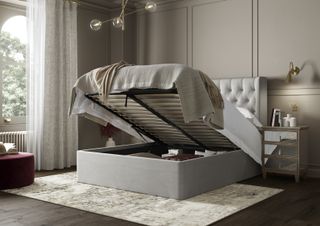 ottoman bed open showing storage inside