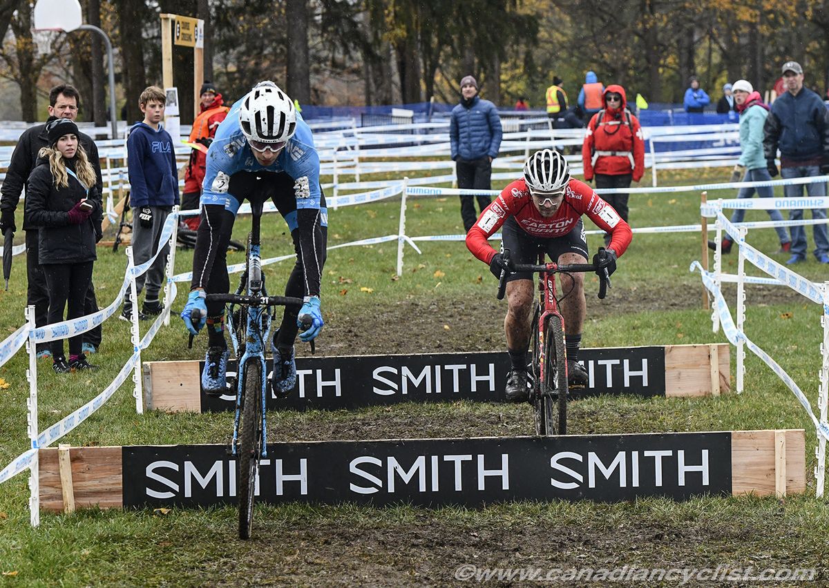Marc-Andr&eacute; Fortier ( Pivot Cycles OTE) and Michael van den Ham (Easton-Giant p/b Transitions Lifecare) hop the barriers.