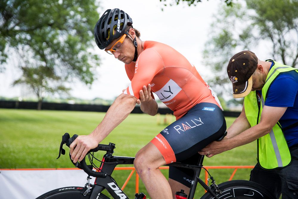 Brad Huff (Rally Cycling) with some last-minute prep before stage 1 at the North Star Grand Prix