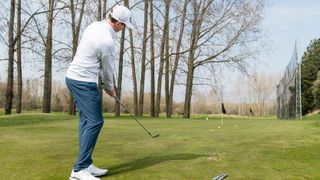 PGA pro demonstrating a chipping drill that will save you shots around the green