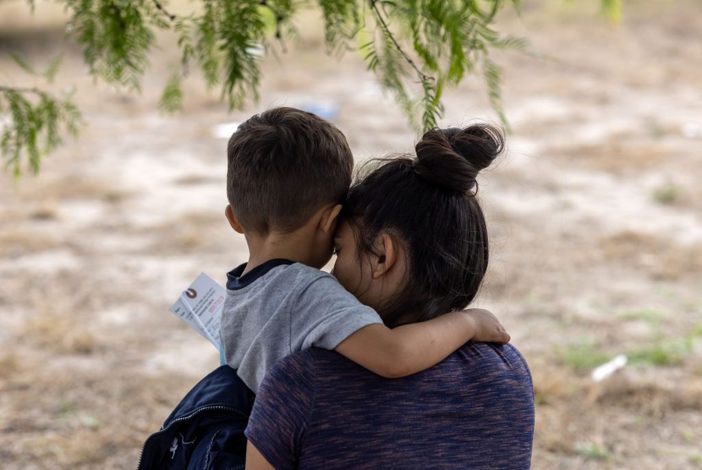 Mother and son migrants from El Salvador.