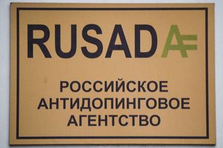 A sign with the logo of the Russian antidoping agency RUSADA is seen on a building housing its offices in Moscow on December 9 2019 The World AntiDoping Agency on December 9 2019 banned Russia from global sporting events including the 2020 Tokyo Olympics and the 2022 Beijing Winter Olympics after accusing Moscow of falsifying data from an antidoping laboratory Photo by Alexander NEMENOV AFP Photo by ALEXANDER NEMENOVAFP via Getty Images