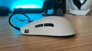 Endgame Gear OP1 8K gaming mouse on a wooden desk