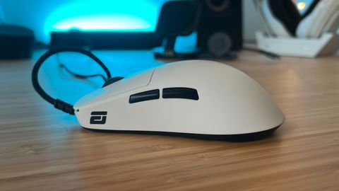 Endgame Gear OP1 8K gaming mouse on a wooden desk