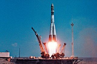 Yuri Gagarin's Vostok-K rocket, seen here lifting off in 1961, was all gray but appeared white at launch due to frost.