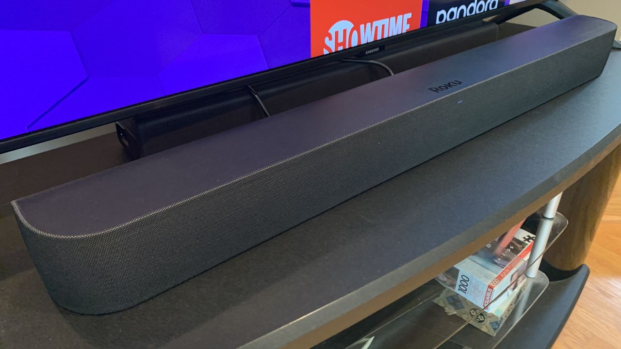 The Roku Streambar Pro in front of a big-screen TV