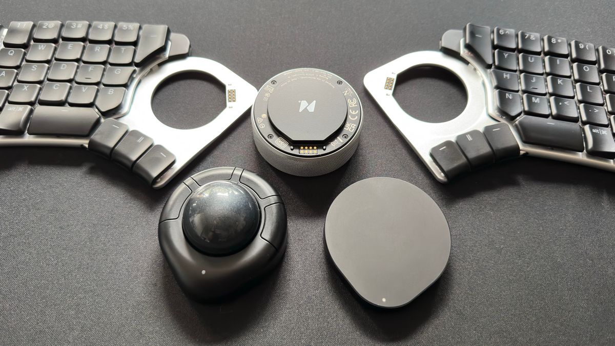 A photo of the Naya Create ergonomic keyboard with three of its optional modules