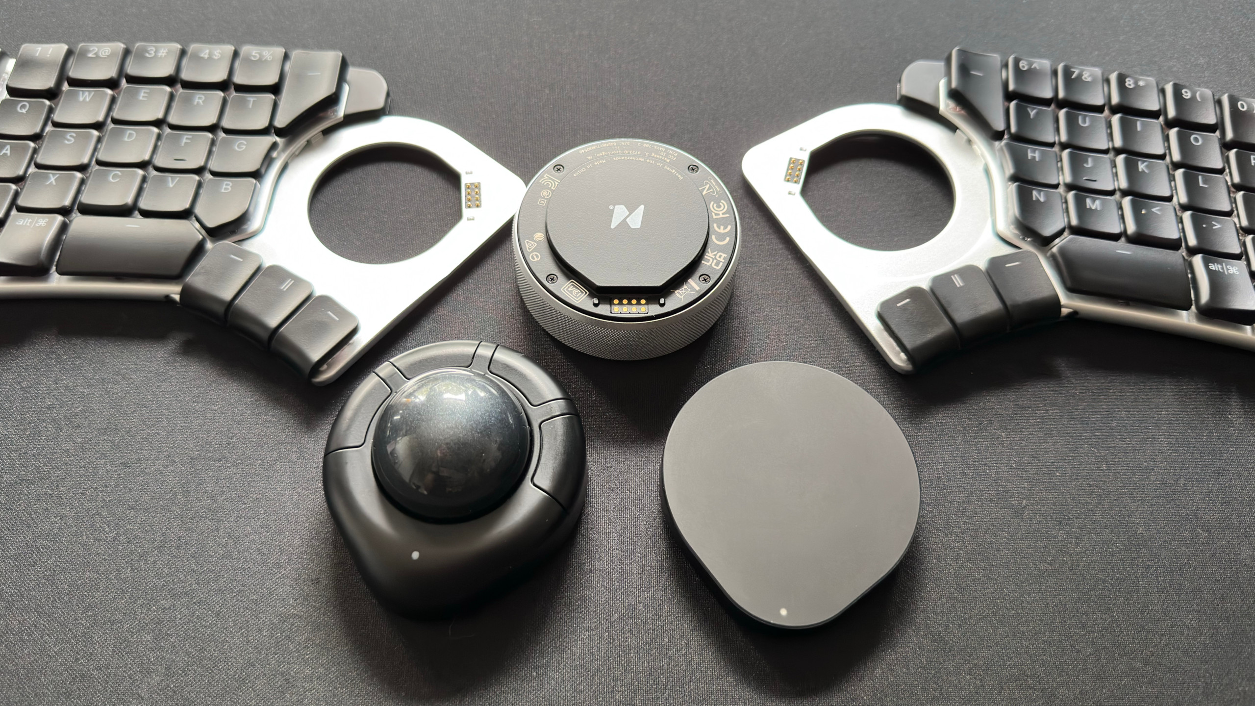 A photo of the Naya Create ergonomic keyboard with three of its optional modules