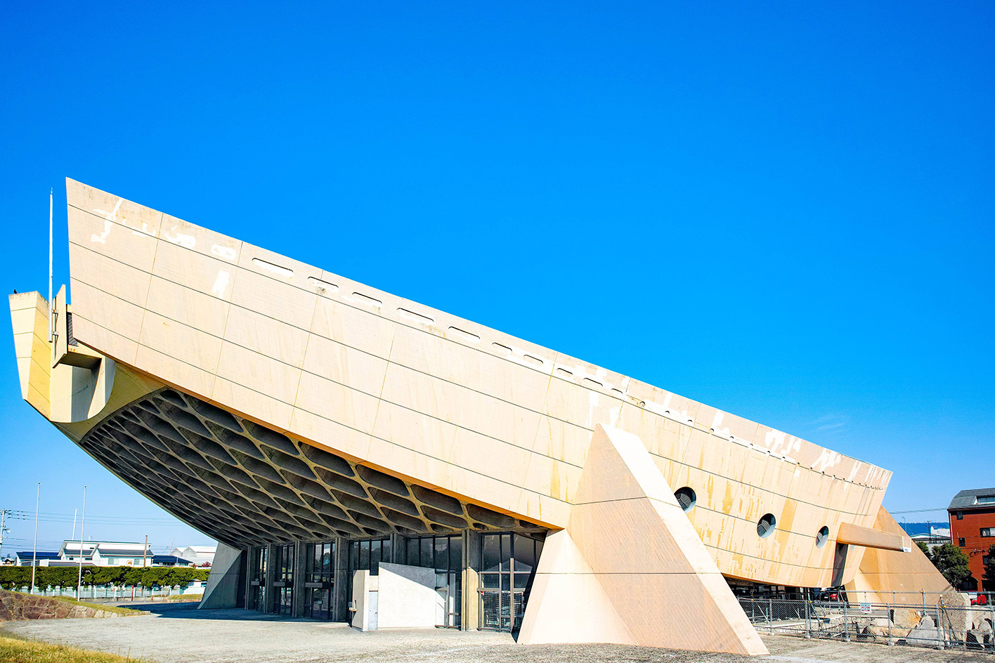Kagawa Prefectural Gymnasium, Kenzo Tange's 'ship gymnasium' in Japan, a curved concrete structure currently under threat of demolition due to neglect