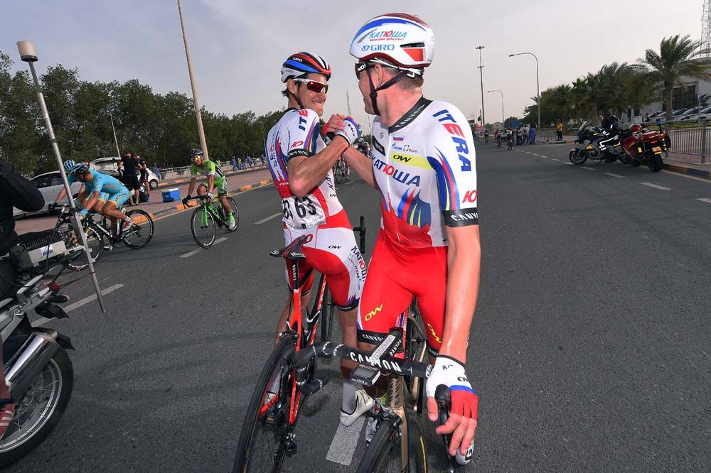 Alexander Kristoff thanks his Katusha teammate Jacopo Guarnieri