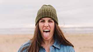 Woman poking out tongue