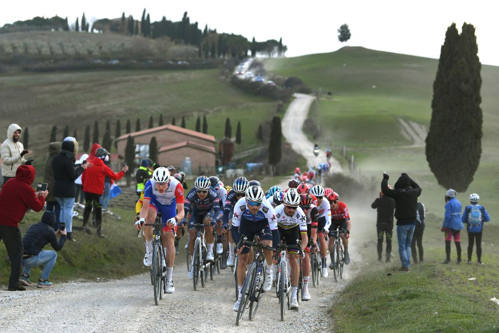 SIENA ITALY MARCH 05 LR Lewis Askey of United Kingdom and Team Groupama FDJ Dries Devenyns of Belgium and Julian Alaphilippe of France and Team QuickStep Alpha Vinyl lead The Peloton during the Eroica 16th Strade Bianche 2022 Mens Elite a 184km one day race from Siena to Siena Piazza del Campo 321m StradeBianche WorldTour on March 05 2022 in Siena Italy Photo by Tim de WaeleGetty Images