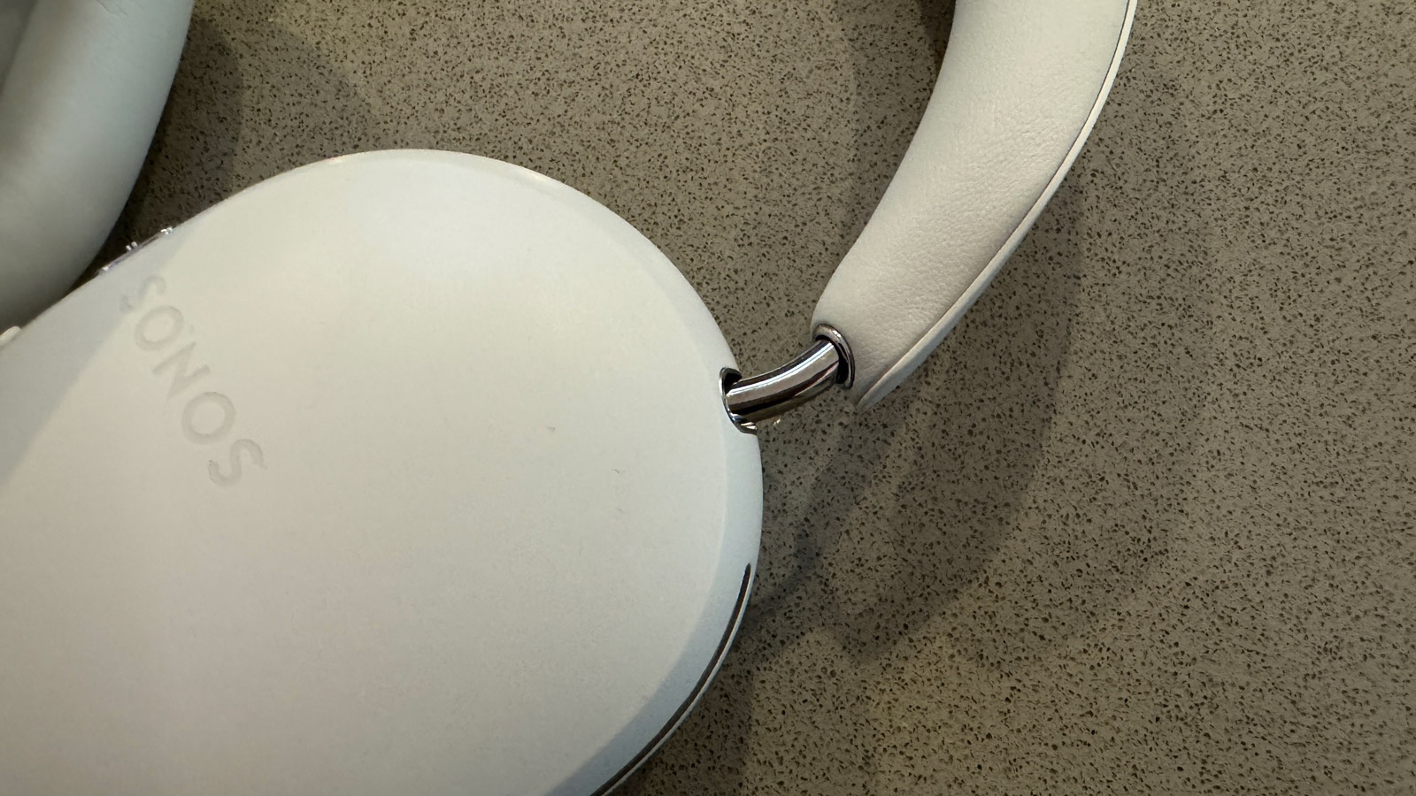 Close up of the hinge mechanism of the Sonos Ace headphones
