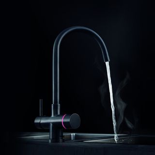 kitchen sink with black electronic tap