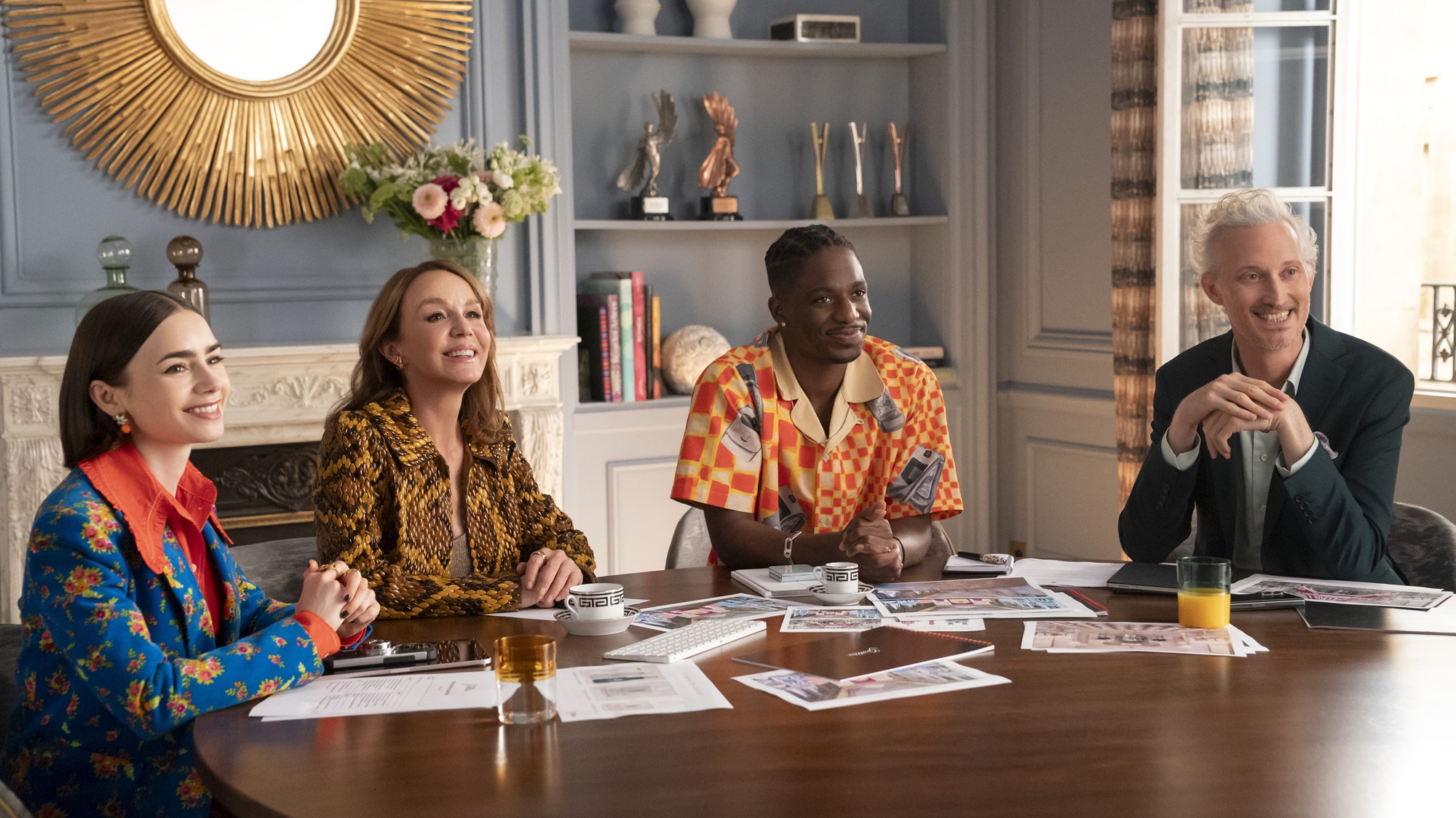 Lily Collins as Emily, Philippine Leroy-Beaulieu as Sylvie Grateau, Samuel Arnold as Julien, Bruno Gouery as Luc in episode 505 of Emily In Paris