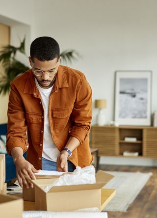 A man with moving boxes