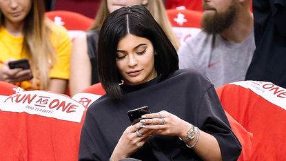 Kylie Jenner, basketball game, phone