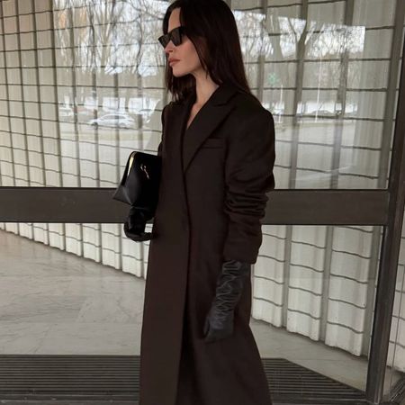 Woman in dark brown winter coat