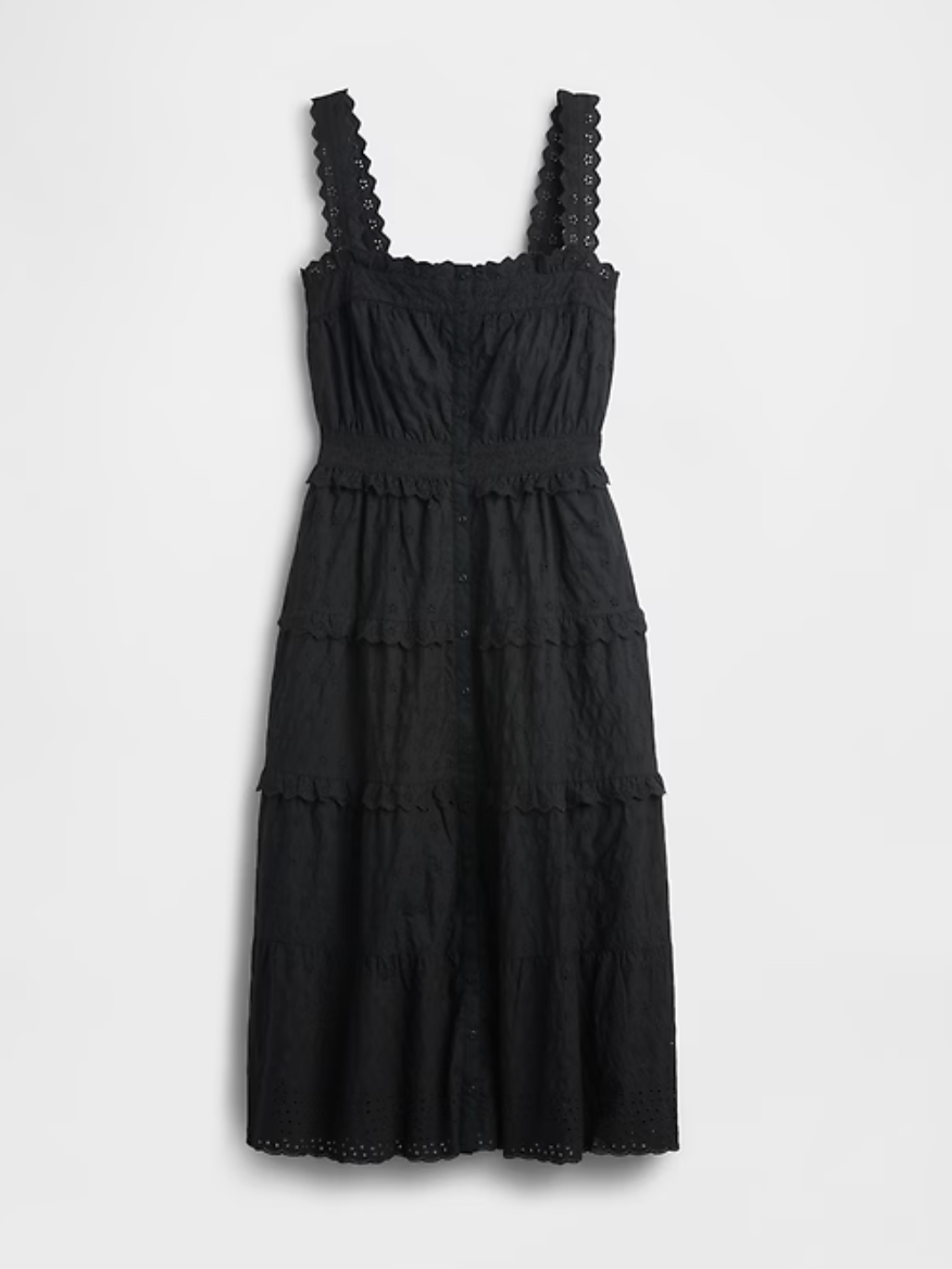 a black gap x doen dress on a plain backdrop